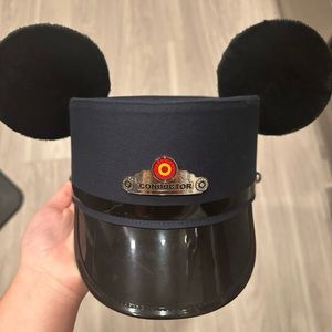 Mickey conductor hat from Disneyland. Brand New with Tags and never worn.